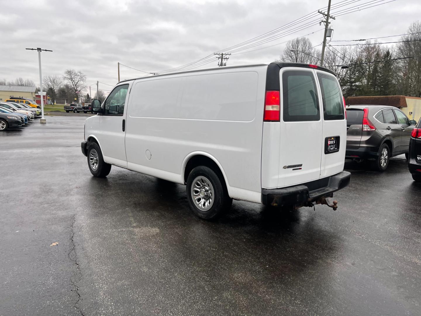 2014 White /Neutral Chevrolet Express 1500 AWD Cargo (1GCSHAF4XE1) with an 5.3L V8 OHV 16V FFV engine, 4-Speed Automatic transmission, located at 547 E. Main St., Orwell, OH, 44076, (440) 437-5893, 41.535435, -80.847855 - Photo#10